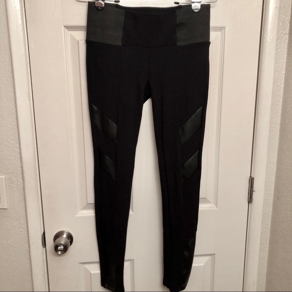 Black leggings with faux leather patches